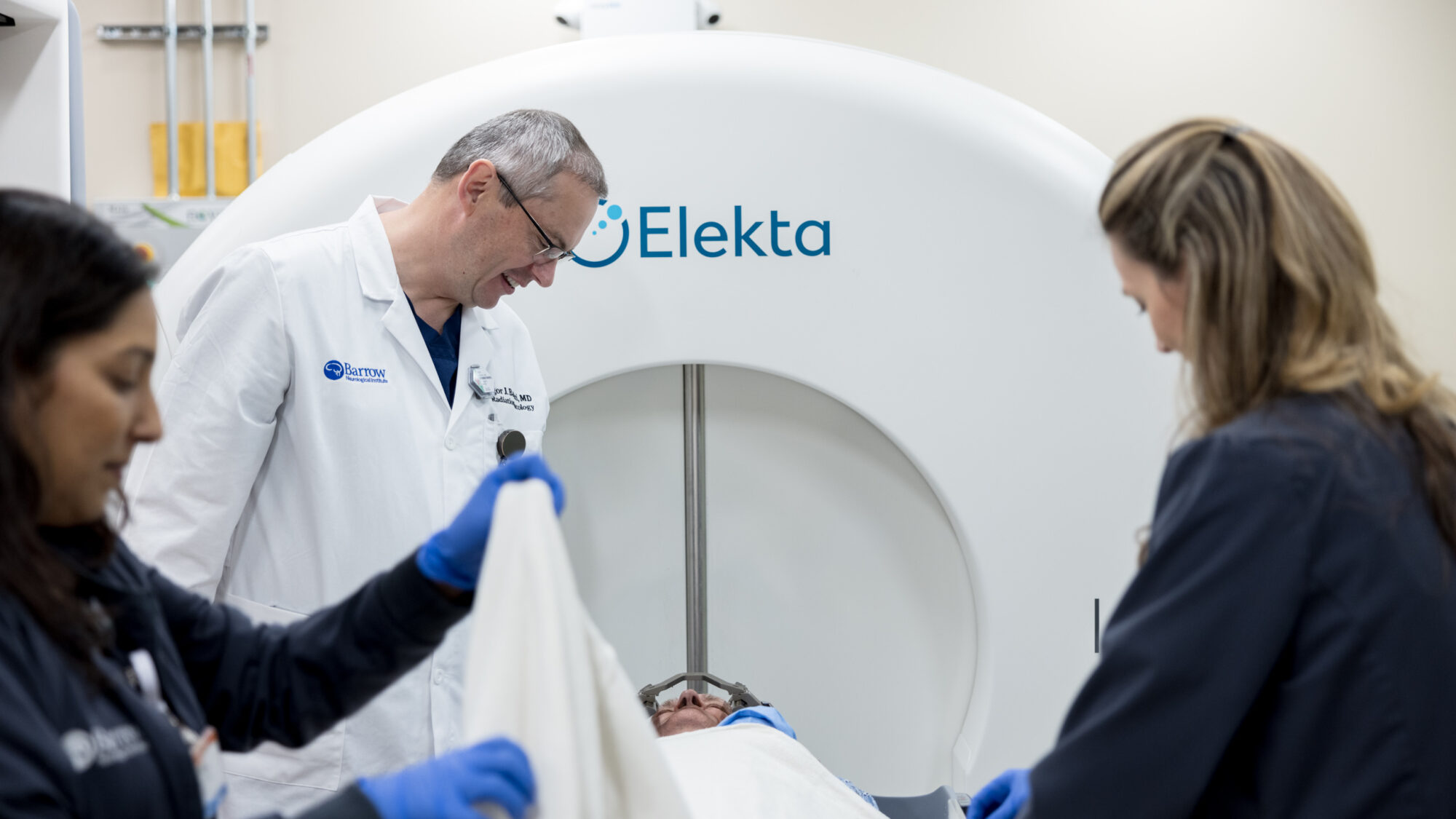 radiation oncologist igor barani counsels a patient before gamma knife treatment