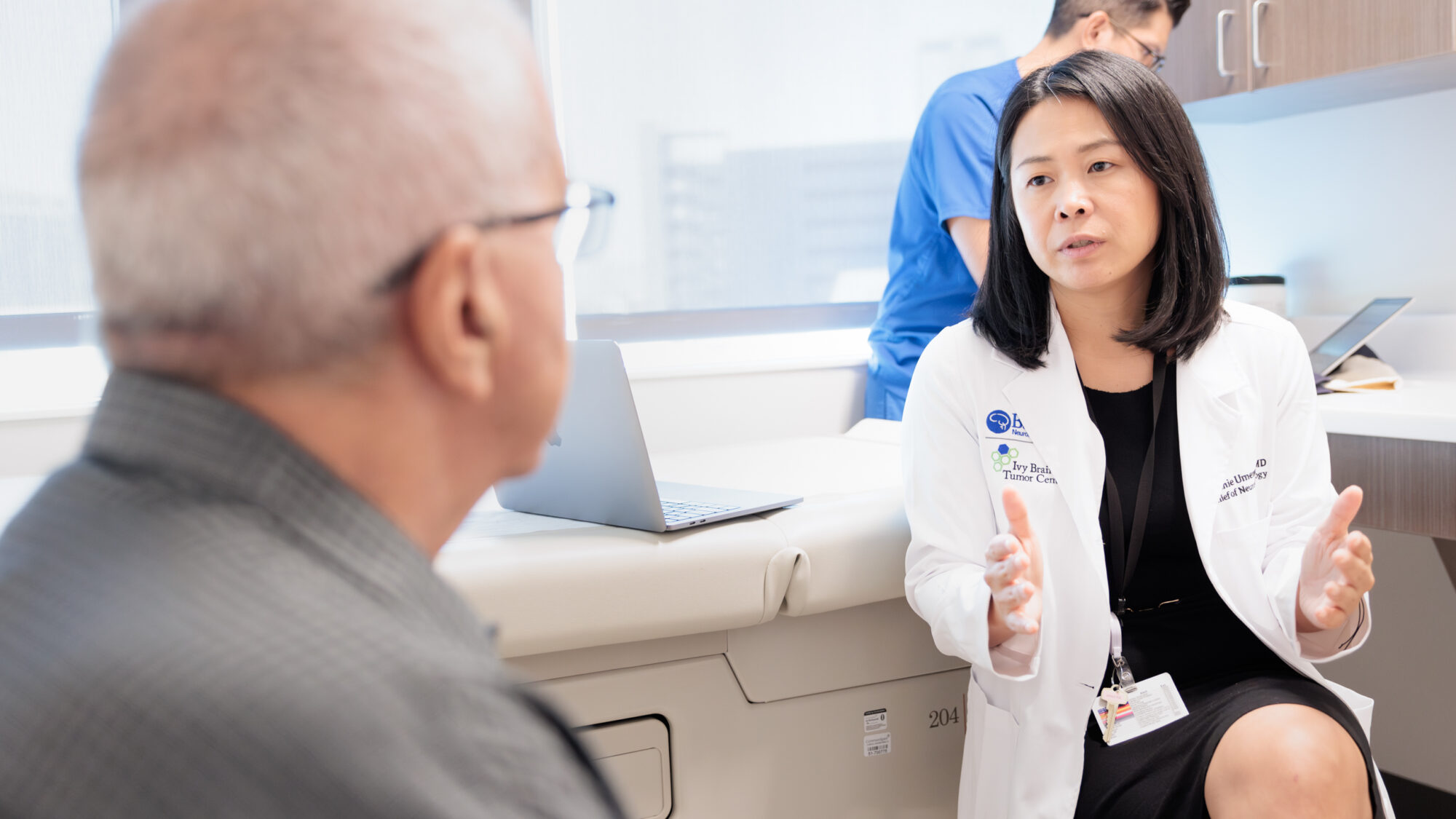 neuro-oncologist yoshie umemura counsels a brain tumor patient