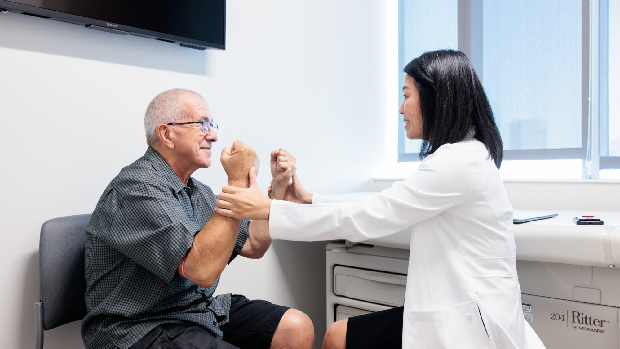 neuro-oncologist yoshie umemura counsels a brain tumor patient