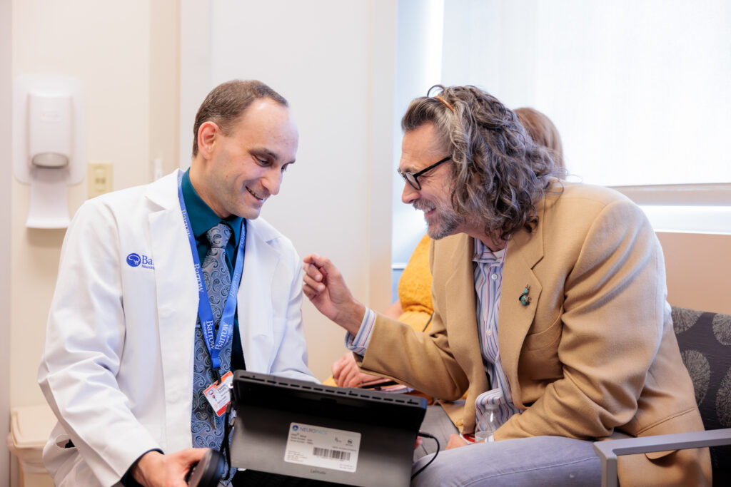 neurologist vladimir shvarts treats an epilepsy patient in an exam room