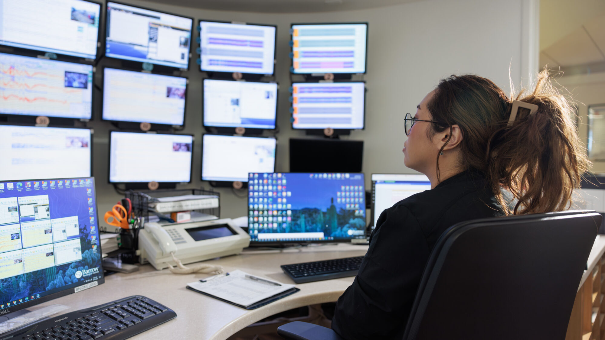 an eeg technologists reviews data in the barrow epilepsy monitoring unit