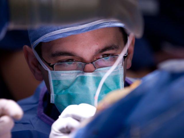 Dr. Ponce working in the operating room