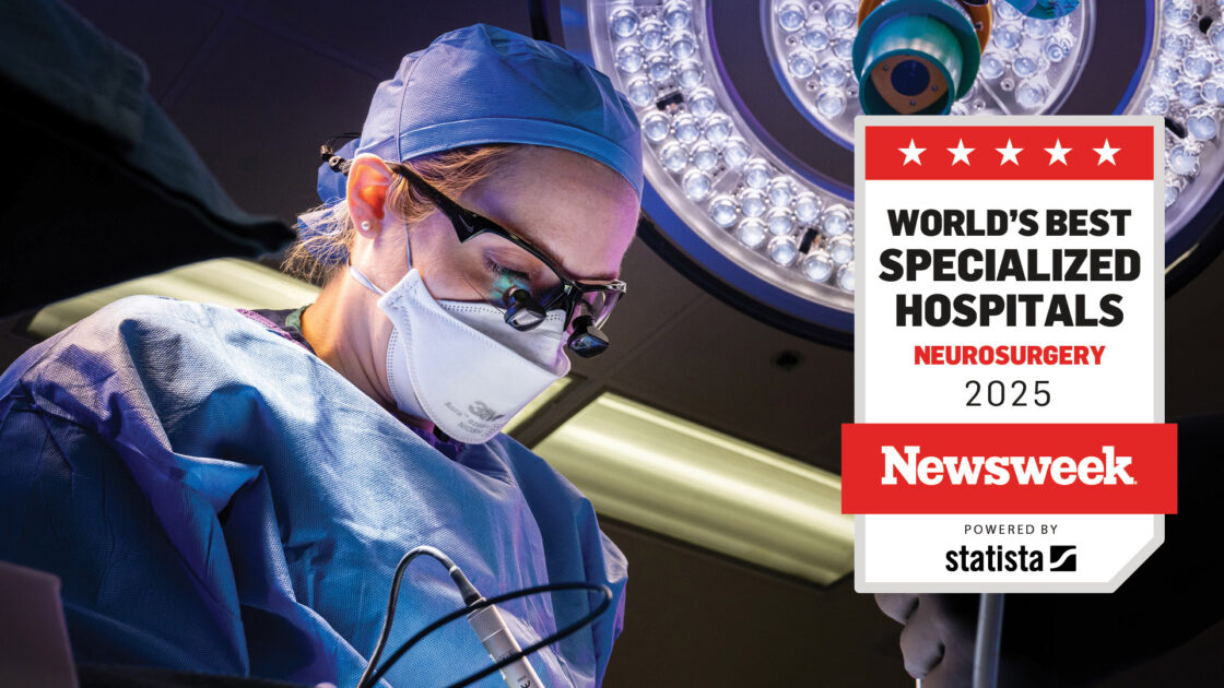 Photo of Dr. Laura Snyder in the operating room with the addition of the Newsweek World's Best Specialized Hospitals for Neurosurgery 2025 badge