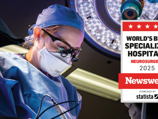 Photo of Dr. Laura Snyder in the operating room with the addition of the Newsweek World's Best Specialized Hospitals for Neurosurgery 2025 badge