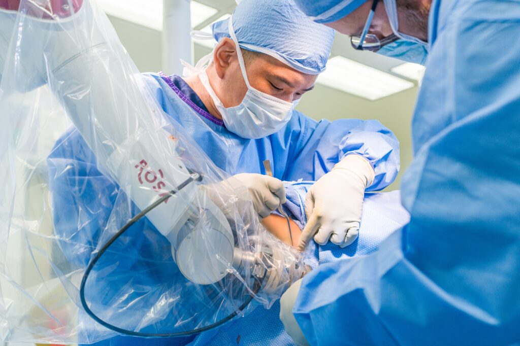 andrew yang uses the rosa robot to perform robotic epilepsy surgery