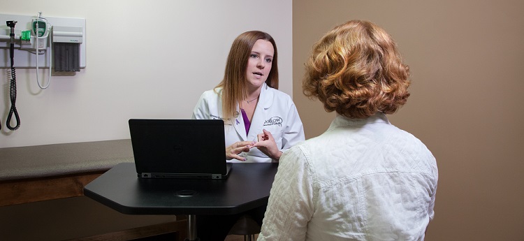 sports neurologist glynnis zieman interacts with a domestic violence patient